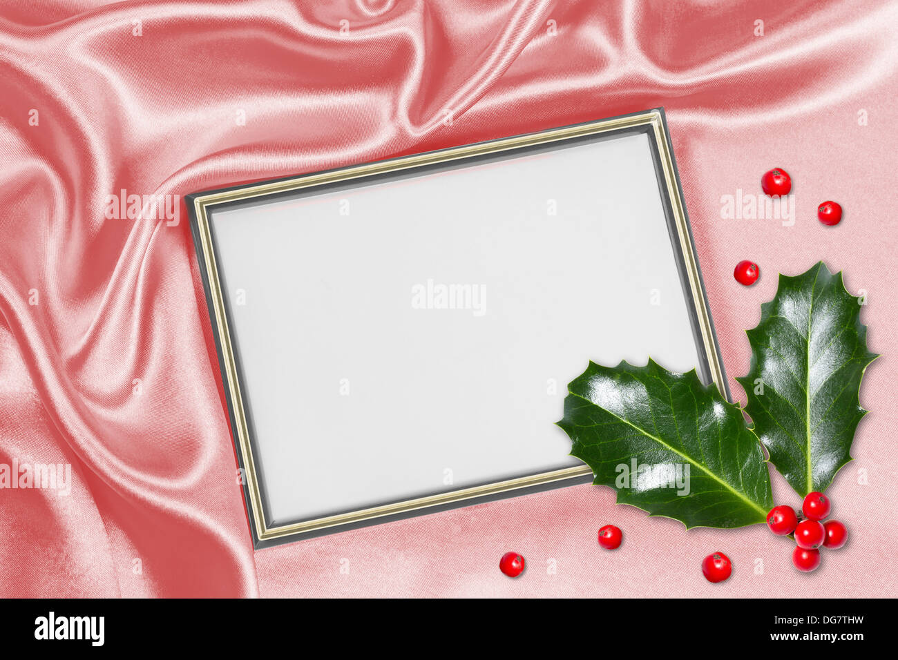 Christmas background with frame for photo and holly leaves Stock Photo ...