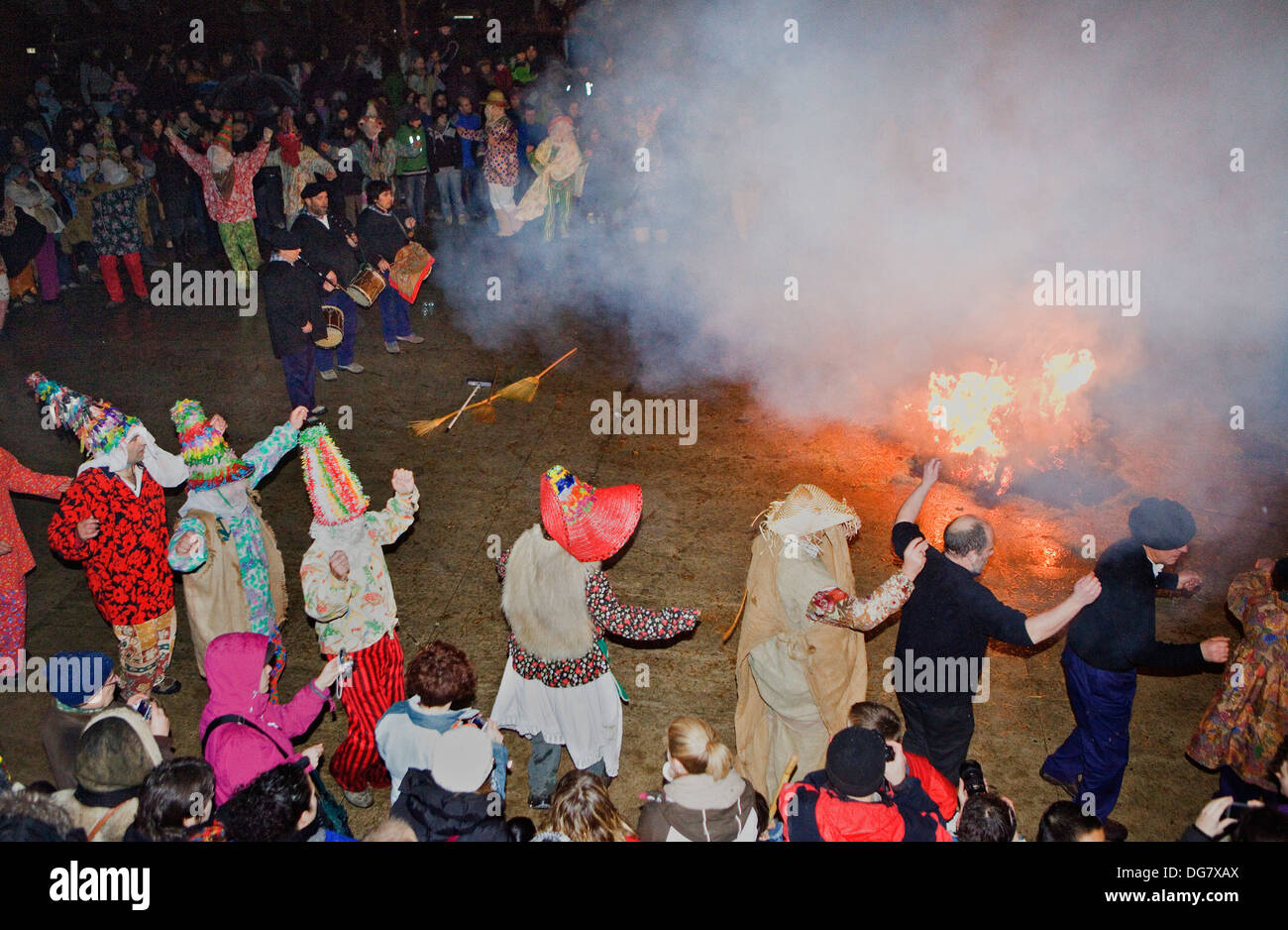 Txatxos dancing the Zortziko dance, and Miel Otxin burning.In FrontÃ³nÂ´. Lantz carnival. Navarra. Spain Stock Photo
