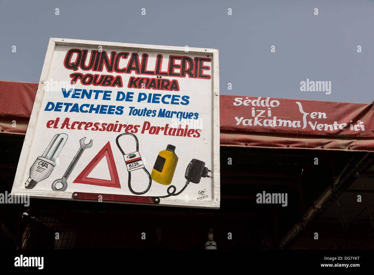 Senegal, Saint Louis. Automobile Spare Parts Shop at Bus and Taxi Station. Stock Photo