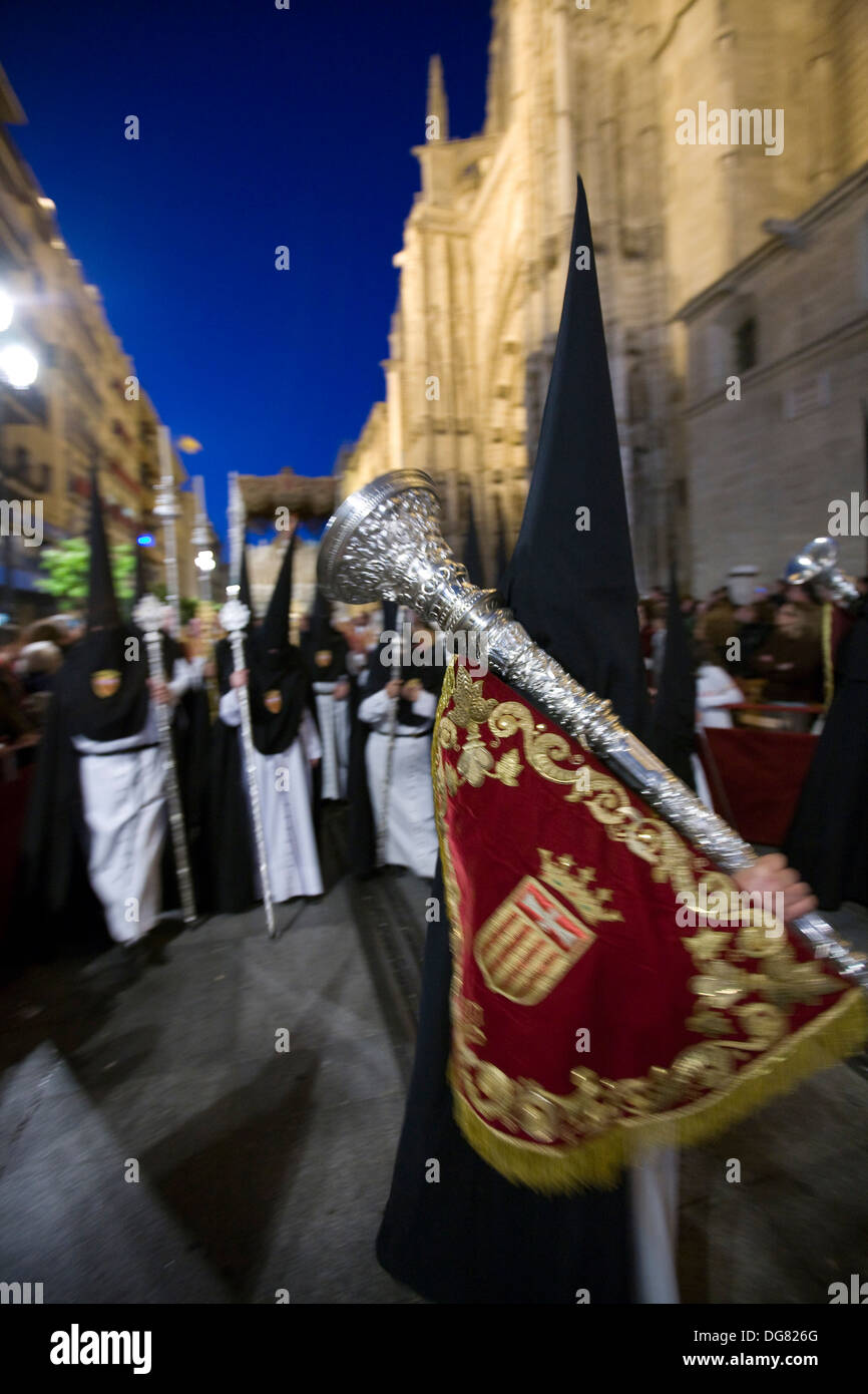 Penitent bearing a bocina or ornamental trumpet during a Holy Week ...
