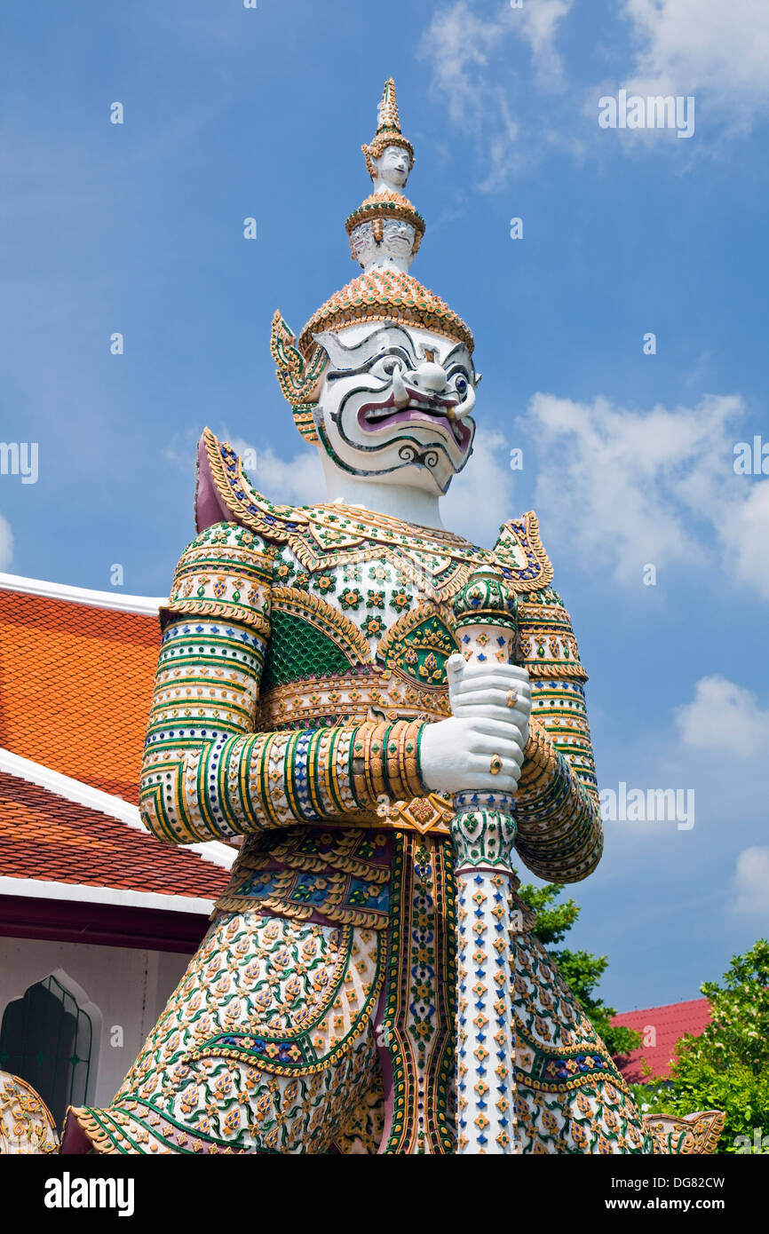 Statue of deity guarding entrance, Wat Arun Rajwararam Temple of the Dawn, Thonburi, Bangkok, Thailand Stock Photo
