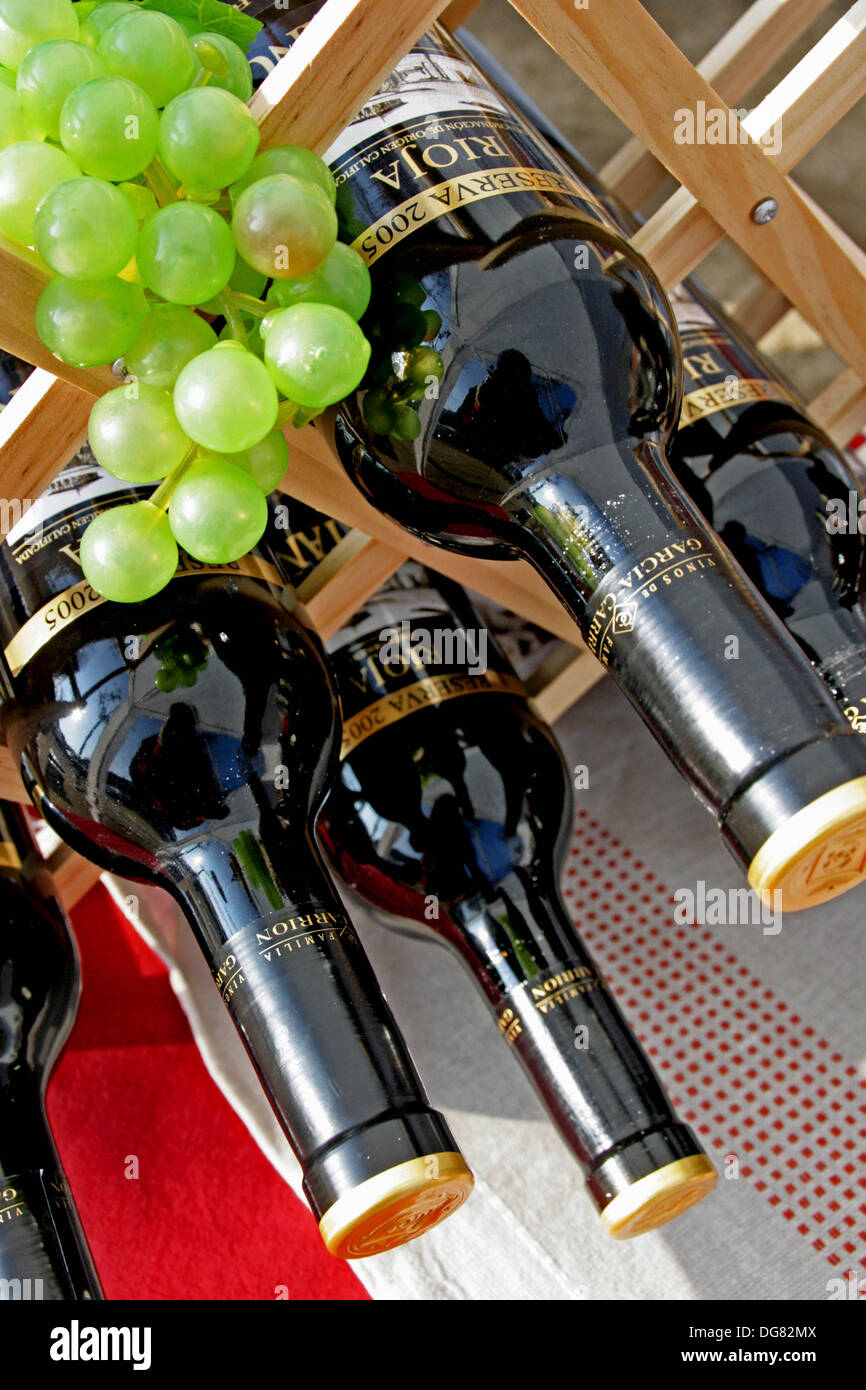 black wine bottles and grapes Stock Photo Alamy