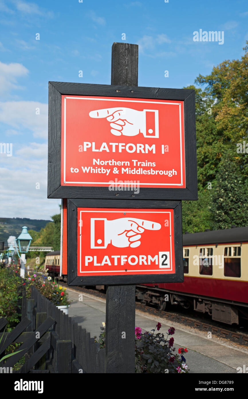 Close up of vintage platform platforms sign signs at Grosmont railway train station NYMR North Yorkshire England UK United Kingdom GB Great Britain Stock Photo