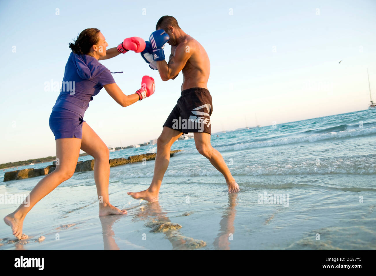 Couple boxing on the beach Stock Photo Alamy