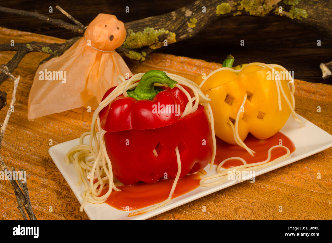 Halloween Party Meal For Kids Fake Pumpkins With Pasta Worms Stock Photo Alamy