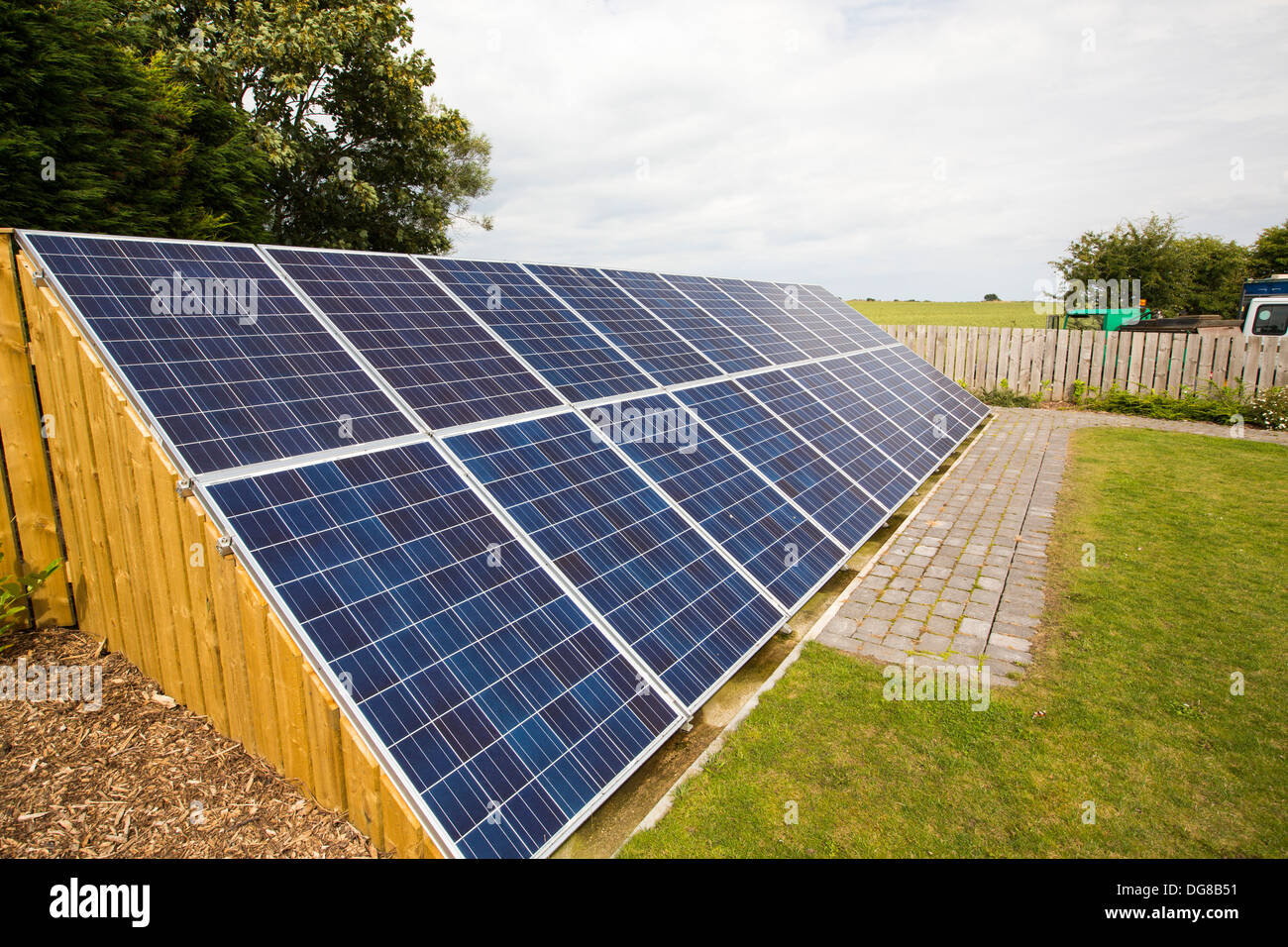 Solar panels in the garden of a house near Aldbrough, Yorkshire, UK