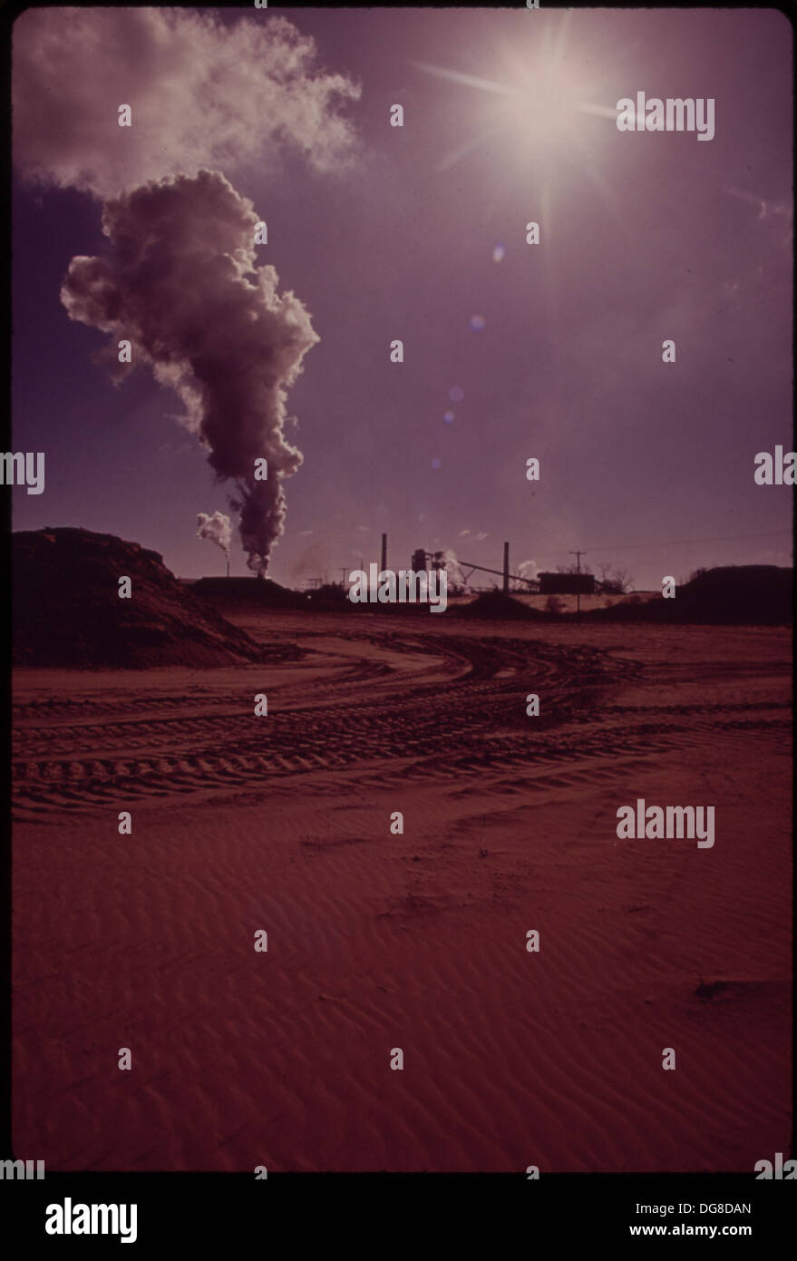 This view from a dune area behind Indiana Harbor looks east toward Bethlehem Steel, a major steel production facility, reflecting industrial activity along the Great Lakes. Stock Photo