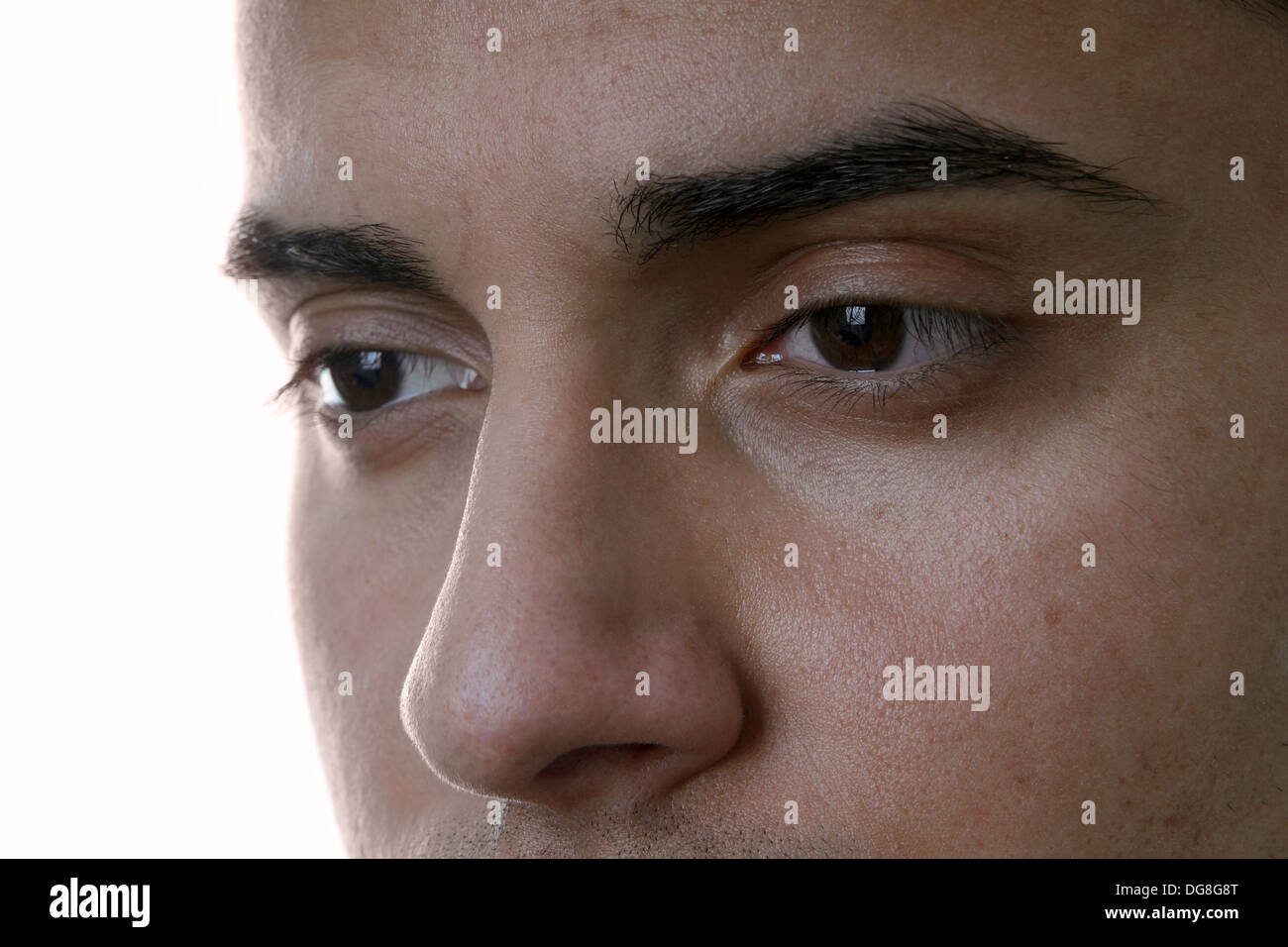 closeup of male face with sad eyes Stock Photo - Alamy