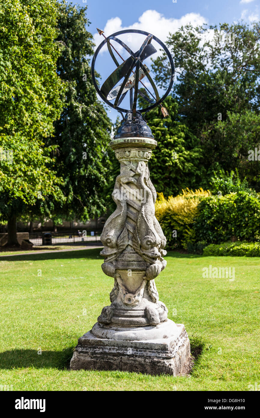 The sundial, a form of orrery, set on a marble dolphin pedestal in the Parade Gardens, Bath, UK. Stock Photo