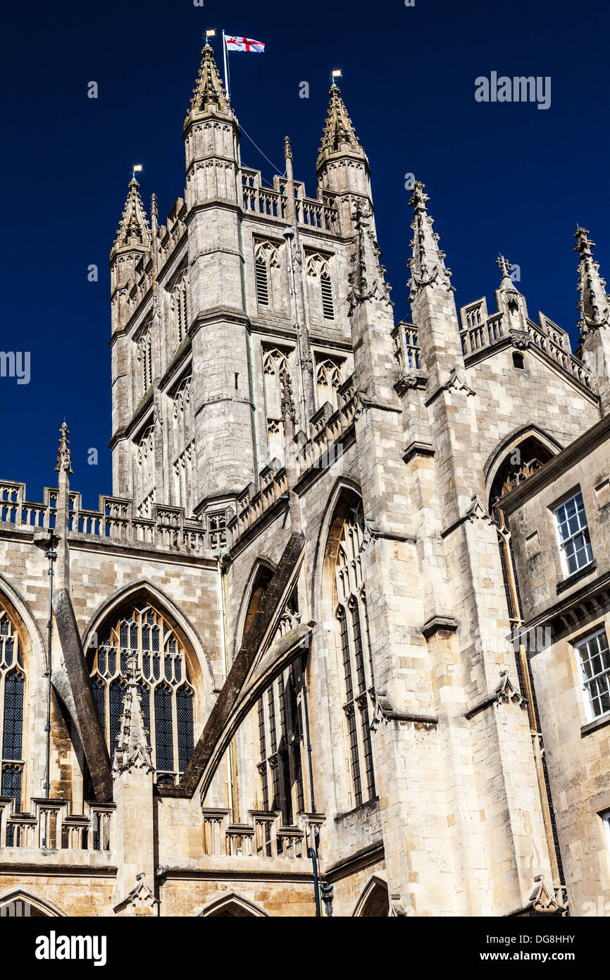 Part of the Gothic south face of Bath Abbey showing the flying butresses, pinnacles, and tower. Stock Photo