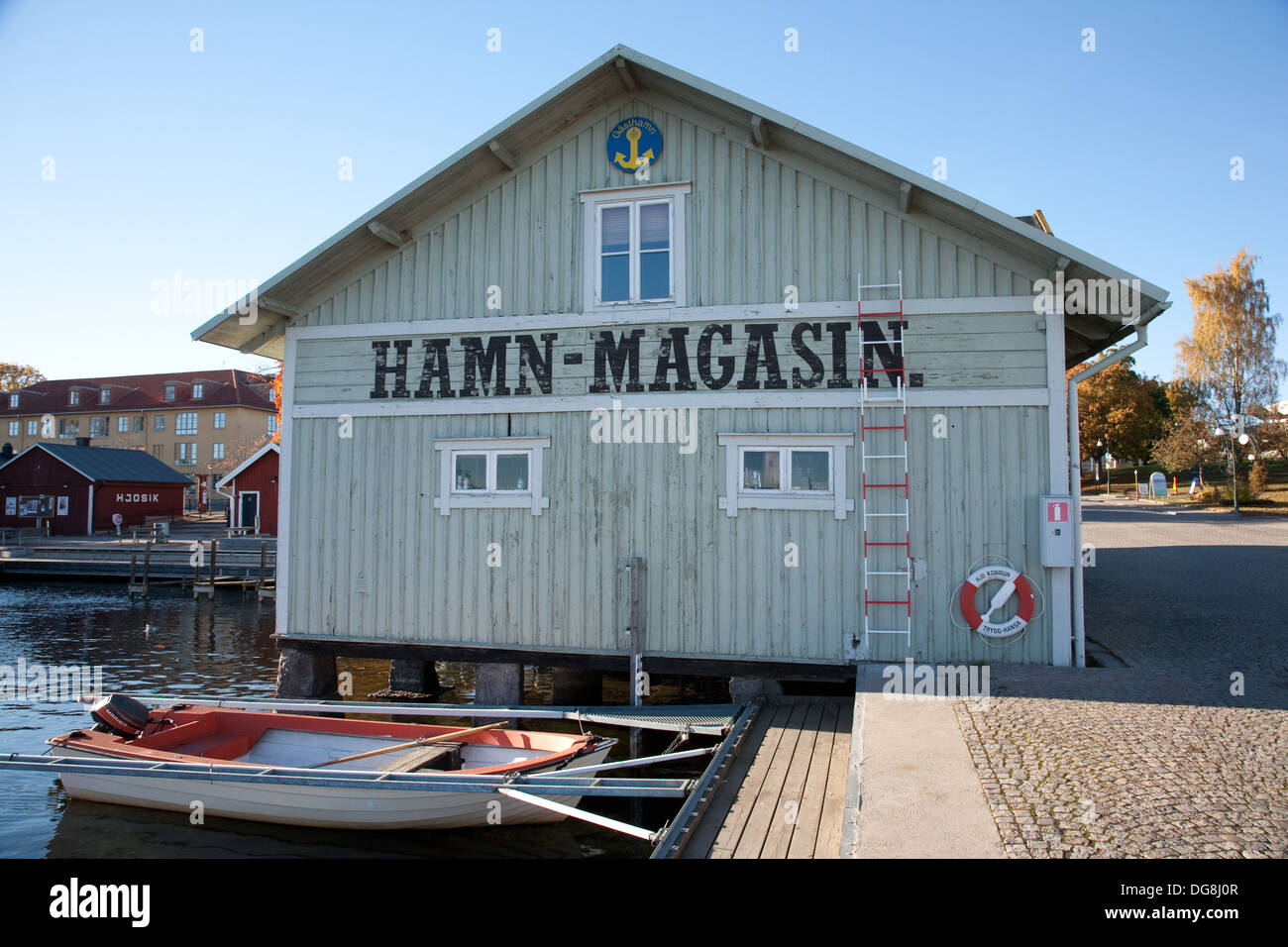 Wooden building in the harbour of Hjo, on lake Vattern, Vasta Gotaland, Sweden Stock Photo