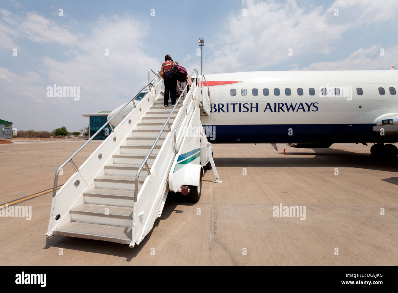 Passengers boarding a British Airways plane, Livingstone airport Zambia Africa Stock Photo