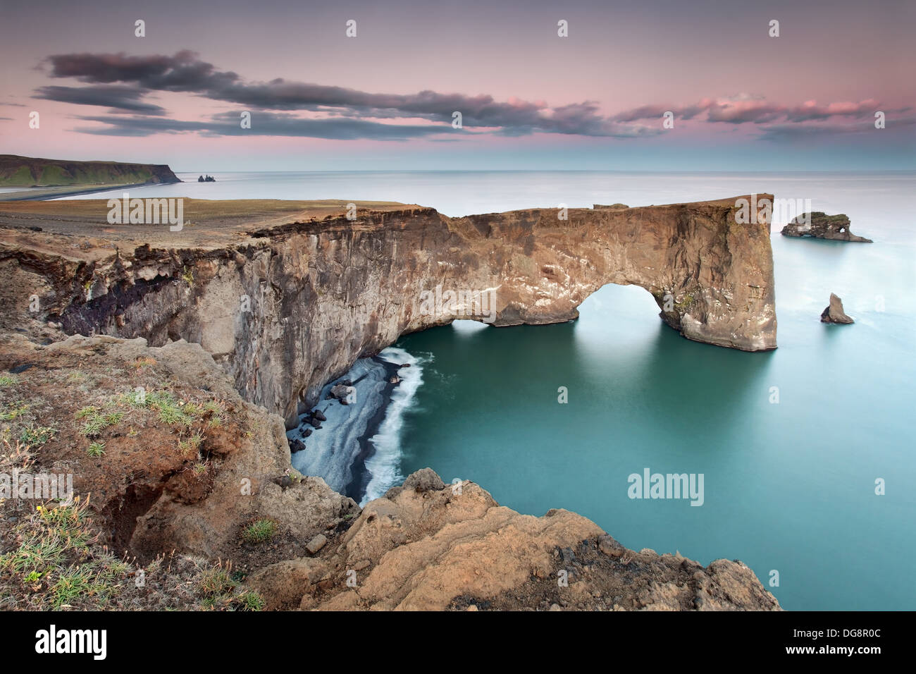 The headland and arches of Dyrholaey, southernmost point in Iceland. Stock Photo