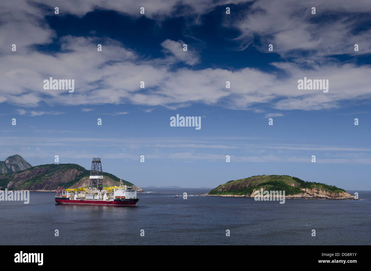 Deep Sea Metro offshore oil drilling ship anchored close to Rio De Janeiro, waiting to go Offshore. Stock Photo