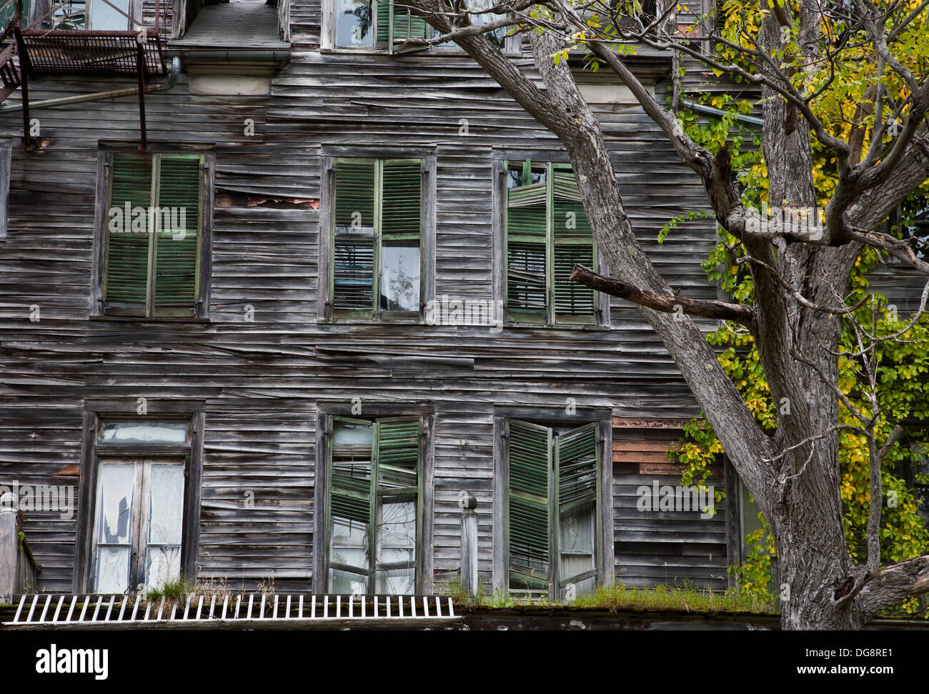 Unusual weathered abandoned house wooden exterior old windows, Vermont