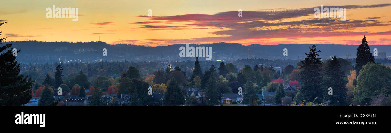 Golden Sunset Over Portland Oregon Cityscape with View of West Hills Panorama Stock Photo