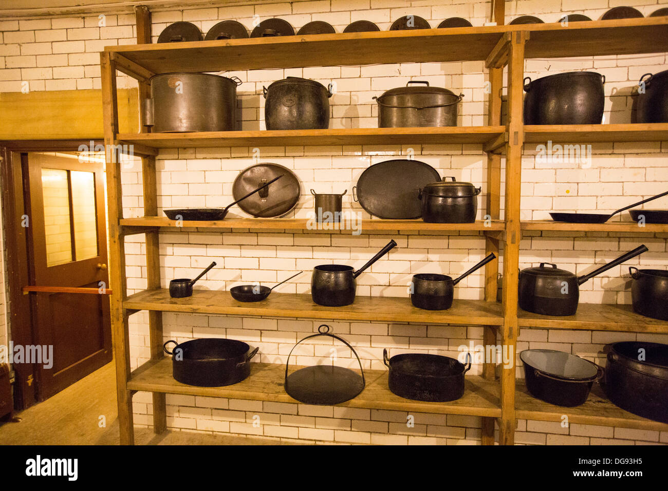 Old metal pots and pans at Cragside, Rothbury, Northumberland, the home of Lord Armstrong, a