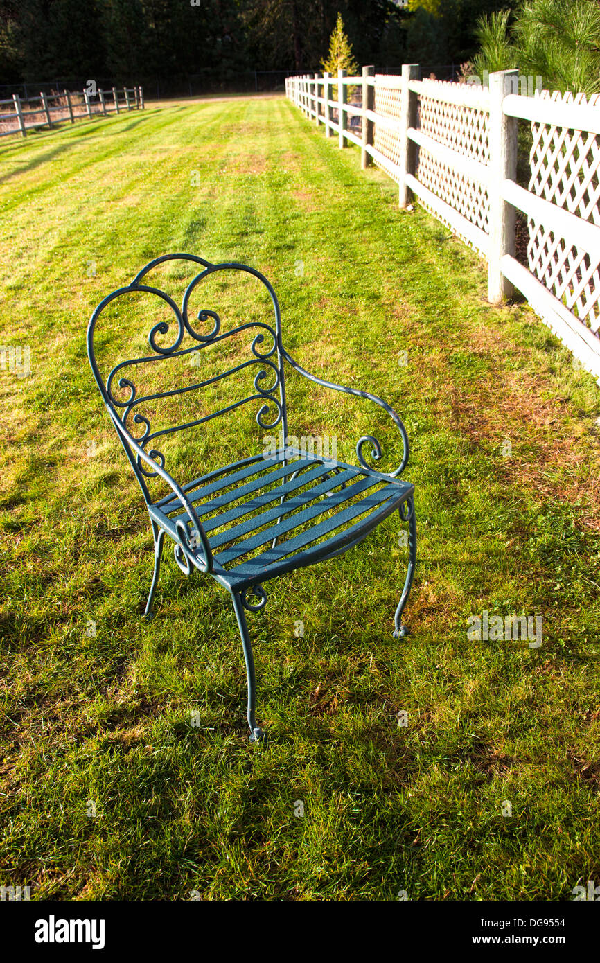 Empty chair on grass. Stock Photo