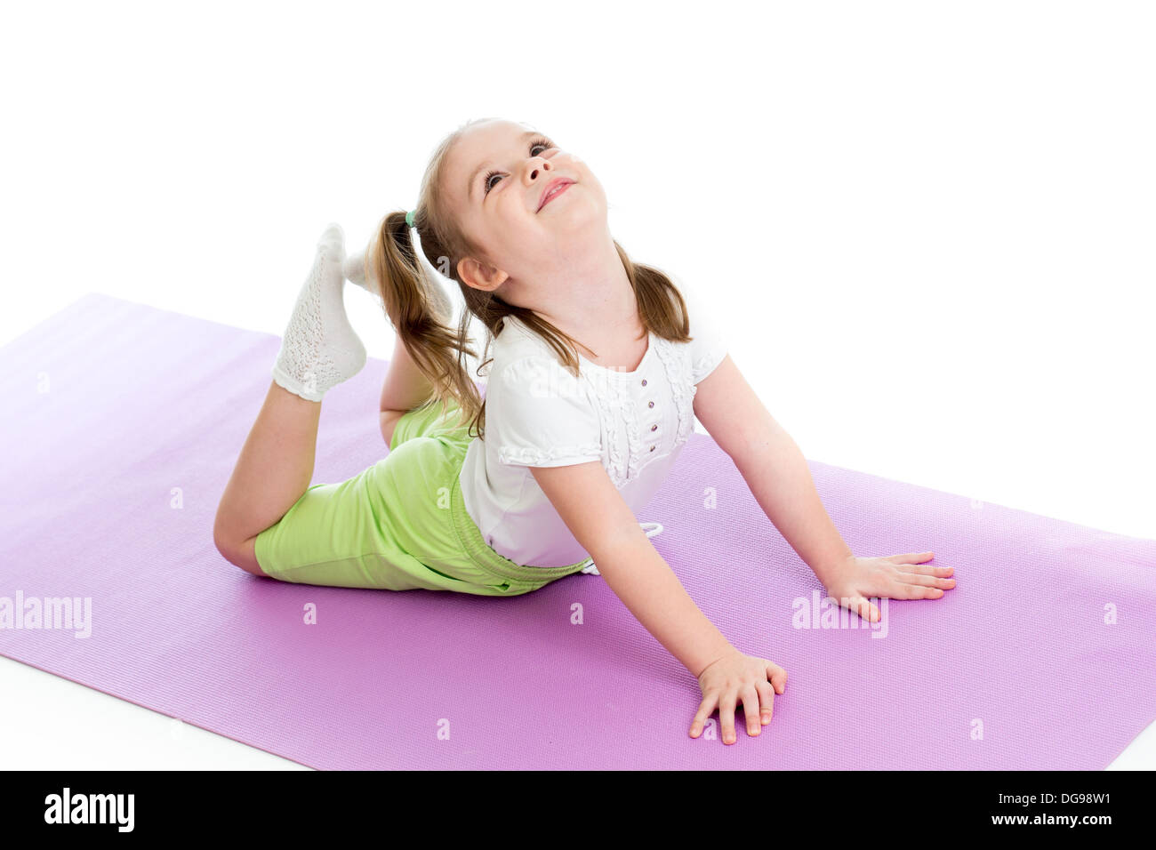 Young girl doing gymnastics Stock Photo