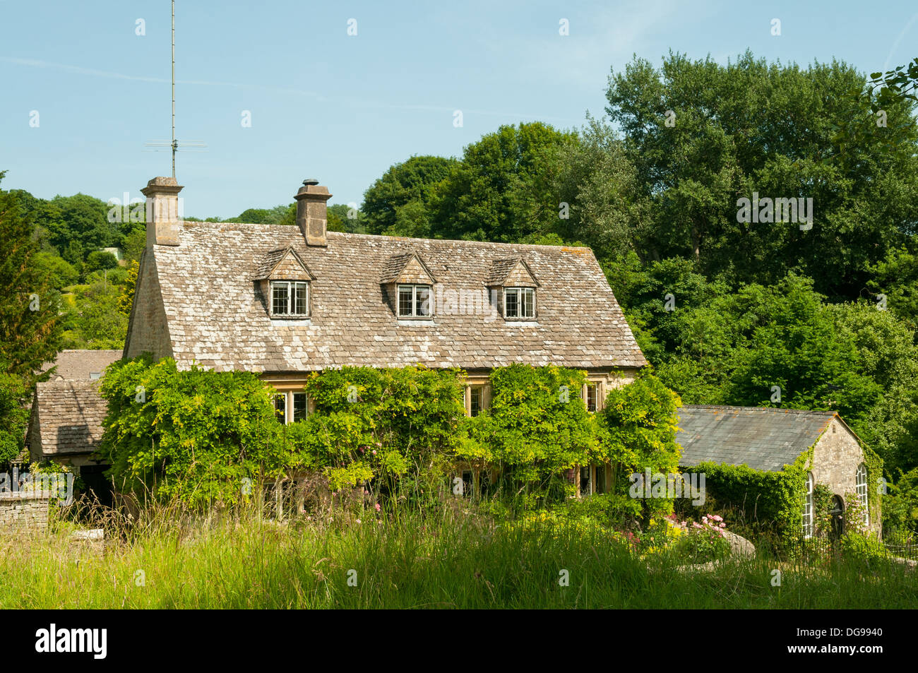 Cottage in Coln St Dennis, Gloucestershire, England Stock Photo