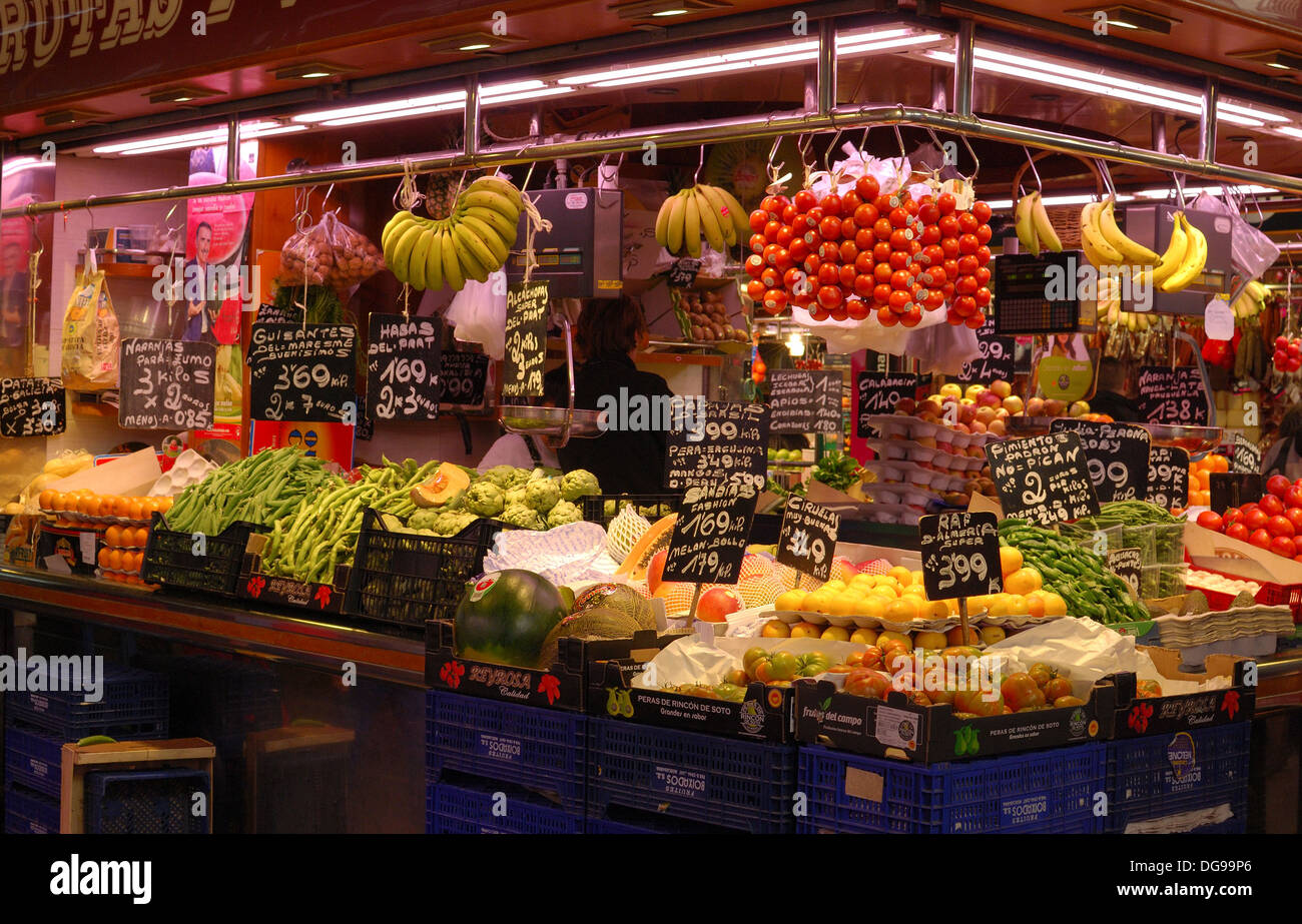 Greengrocer and Fruit shop in indoor market La Boqueria on Las Ramblas. Barcelona. Catalonia. Spain. Stock Photo