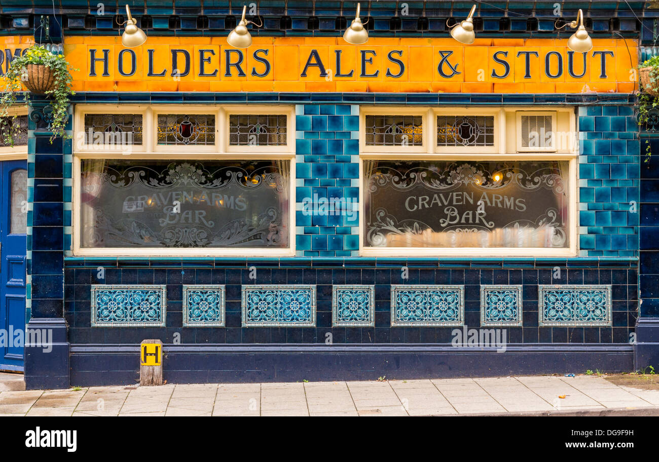 Holders Ales and Stout traditional pub with tiled exterior in