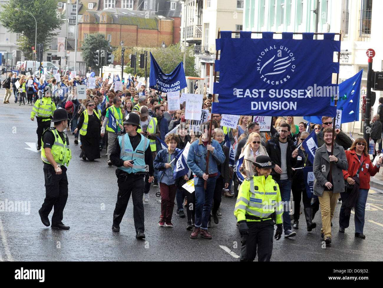 Thousands of striking teachers marching through Brighton today as part of their national one day of action against cuts to their pay and pensions Stock Photo