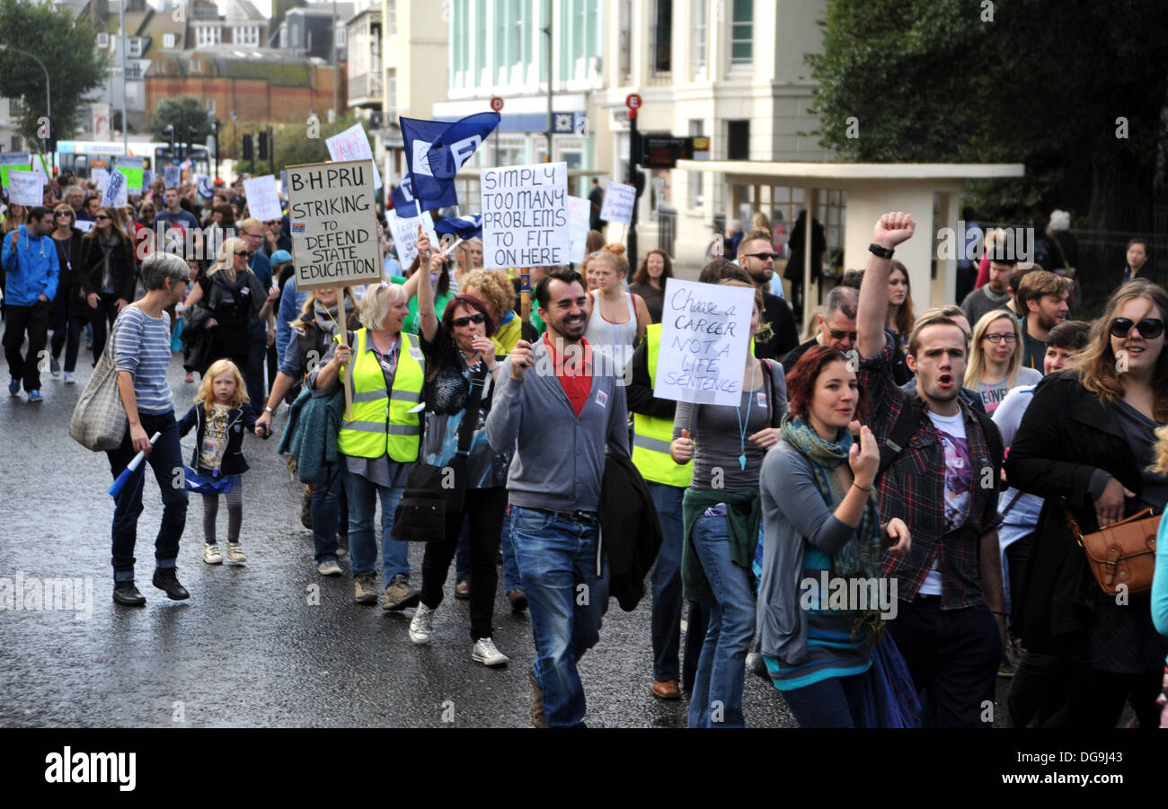 Thousands of striking teachers march past the Royal Pavilion in Brighton today as part of their national one day of action against cuts to their pay and pensions Stock Photo