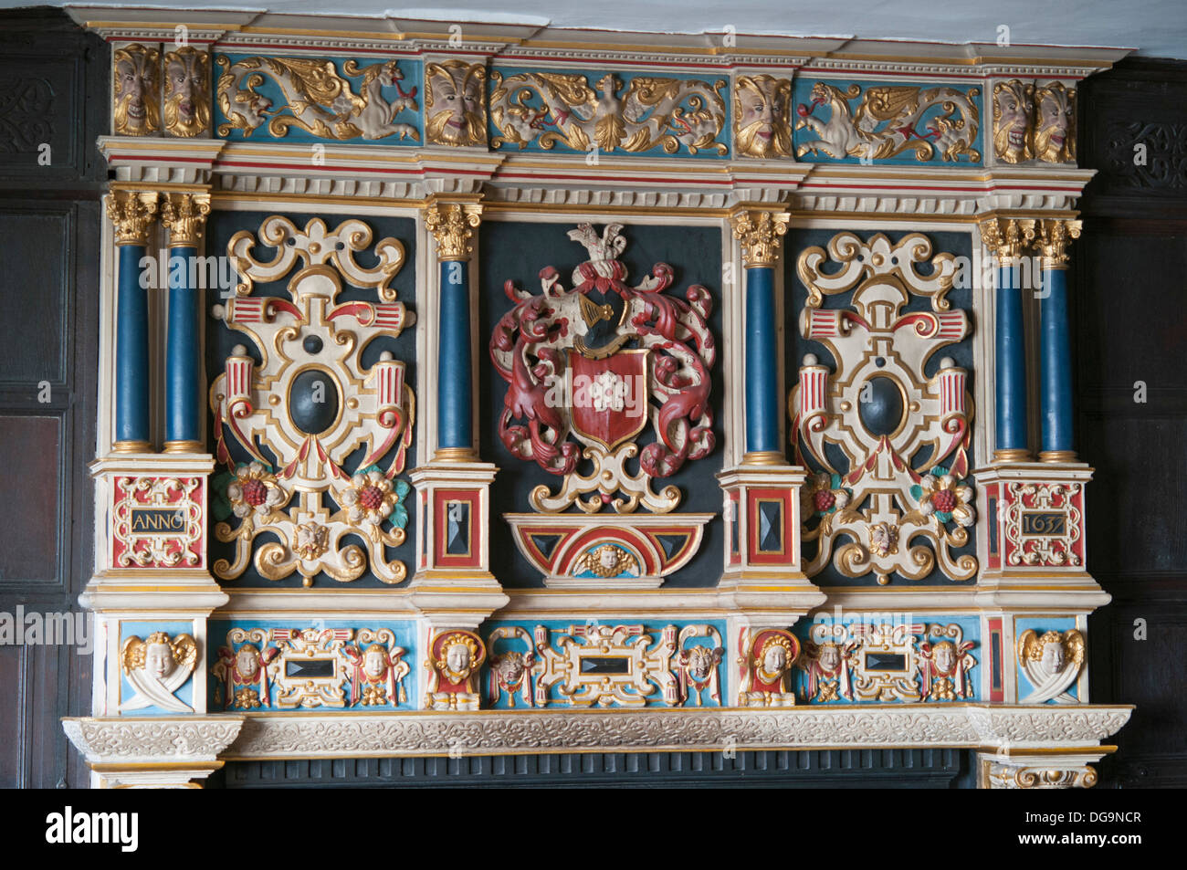 Ornate wooden fireplace inside the Mayor's Parlour, Leicester's