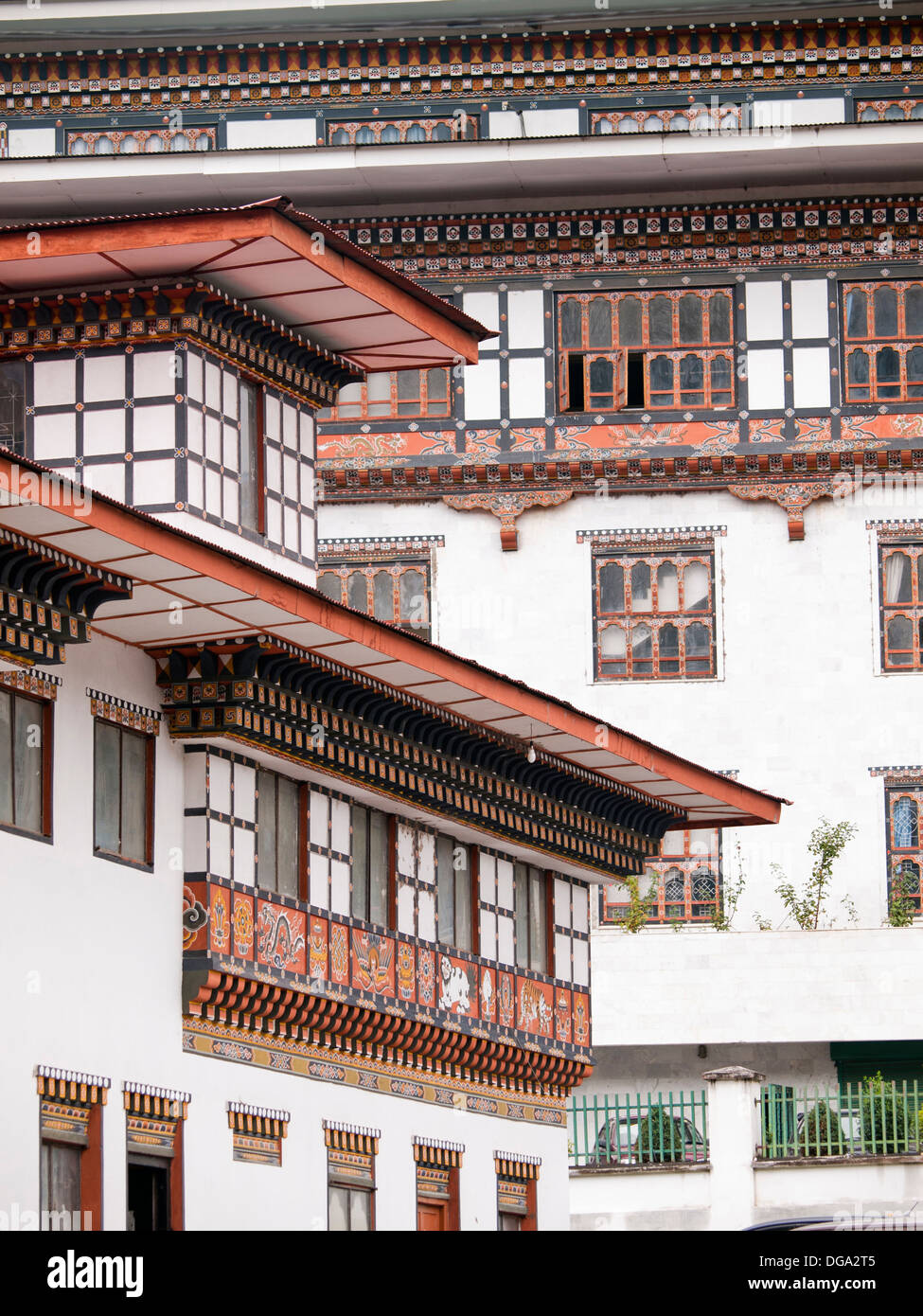 The traditional architecture of the Bhutanese houses as seen in Bhutans capitol Thimphu Stock Photo