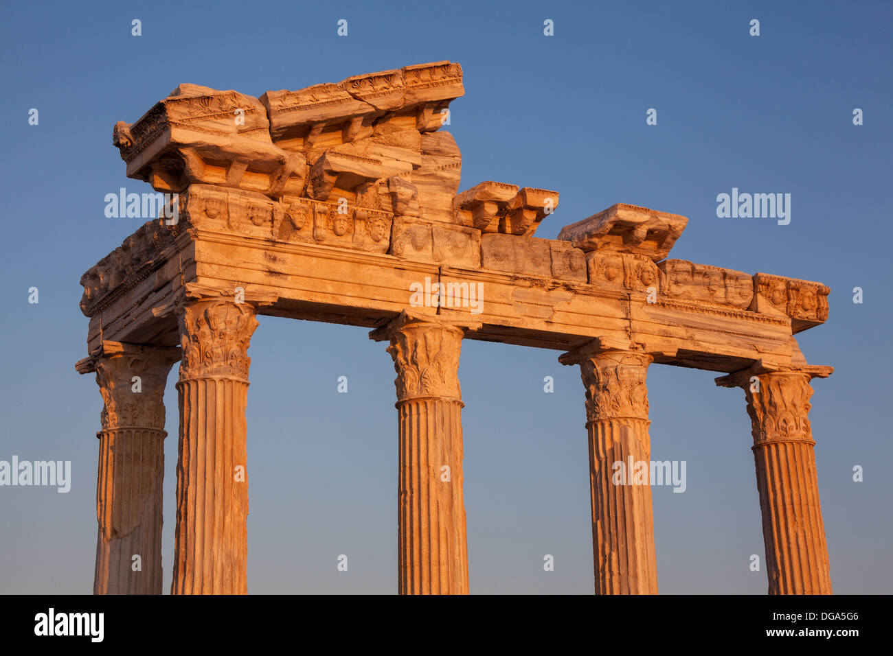 Ancient ruins of Roman Empire ( construction date about II century) at sunset. Apollo Temple, Side, Turkey. Stock Photo