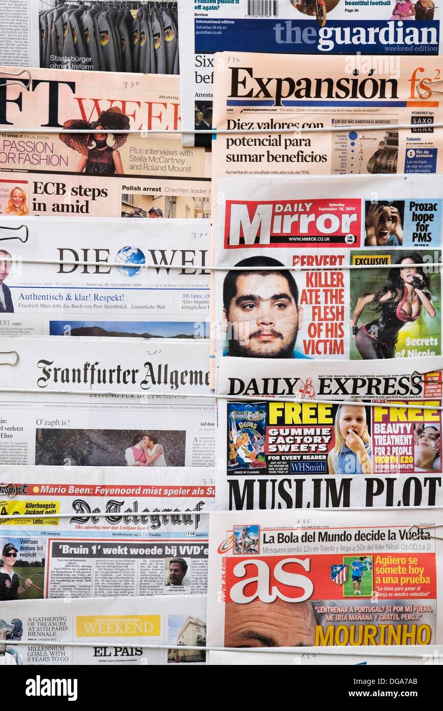 English and foreign language newspapers at a newsstand in Lisbon, Portugal,  Europe Stock Photo - Alamy