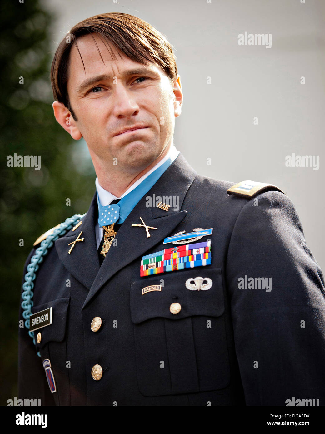 Former US Army Capt. William D. Swenson speaks to the media outside the White House after he was presented with the Medal of Honor by President Barack Obama October 15, 2013 in Washington, DC. The Medal of Honor is the nation's highest military honor. Stock Photo