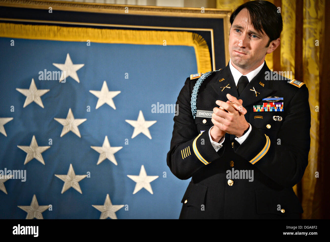 US Army Capt. William D. Swenson during the Medal of Honor ceremony in the East Room of the White House October 15, 2013 in Washington, DC. The Medal of Honor is the nation's highest military honor. Stock Photo