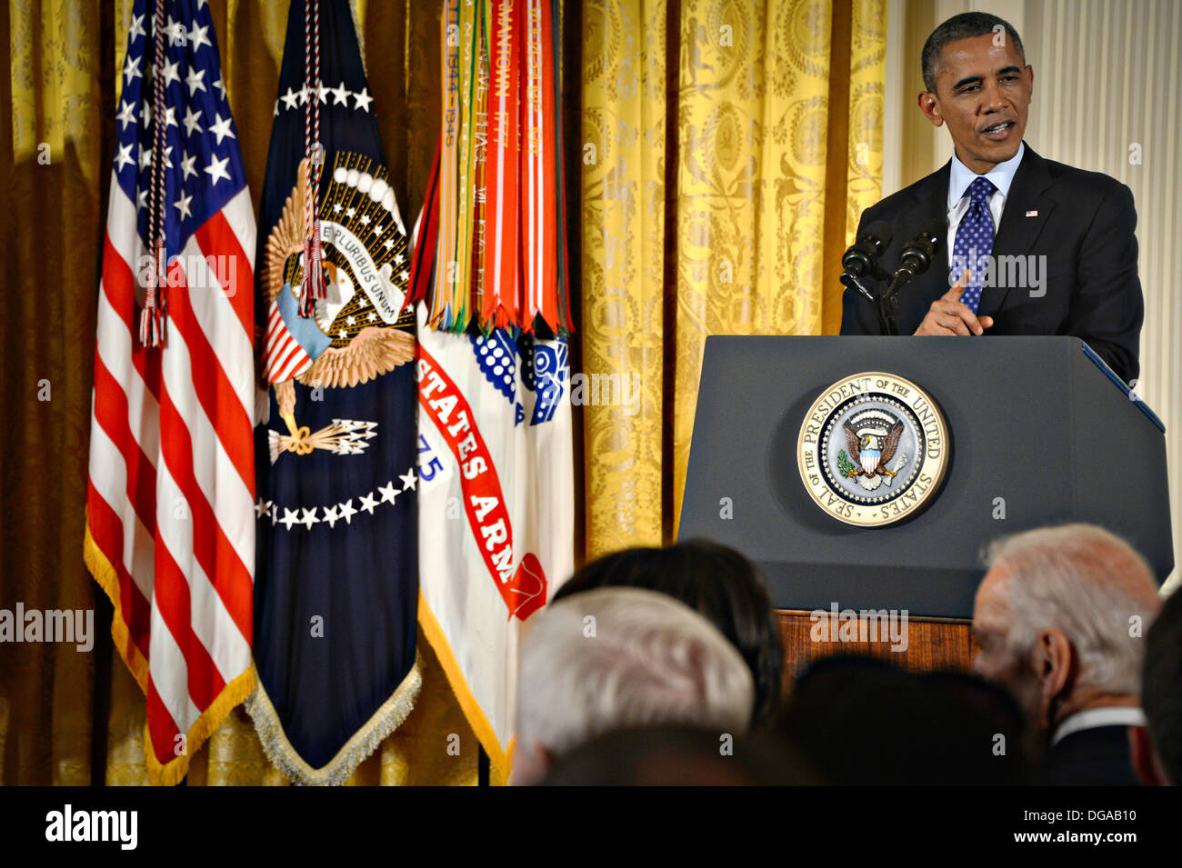 US President Barack Obama speaks during the Medal of Honor ceremony for Army Capt. William D. Swenson in the East Room of the White House October 15, 2013 in Washington, DC. The Medal of Honor is the nation's highest military honor. Stock Photo