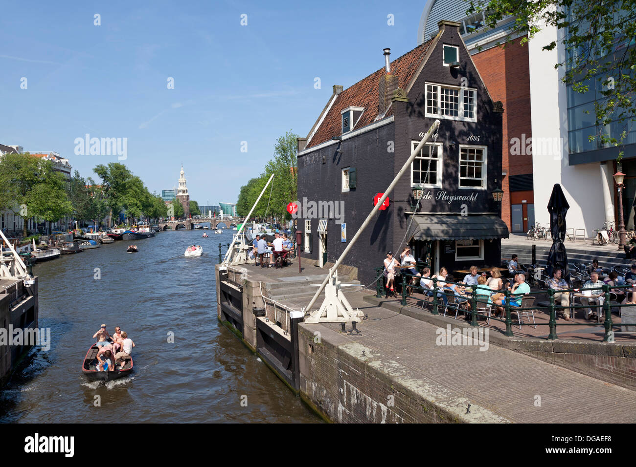 Lock in the canal in Amsterdam with in the background the Montelbaans tower Stock Photo