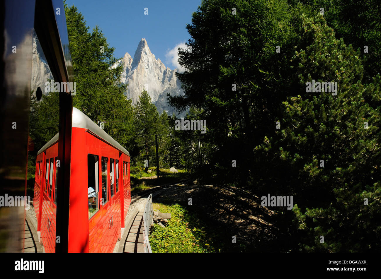 The aiguille de Dru and Montenvers seen from inside the Montenvers funicular railway, Chamonix, France Stock Photo