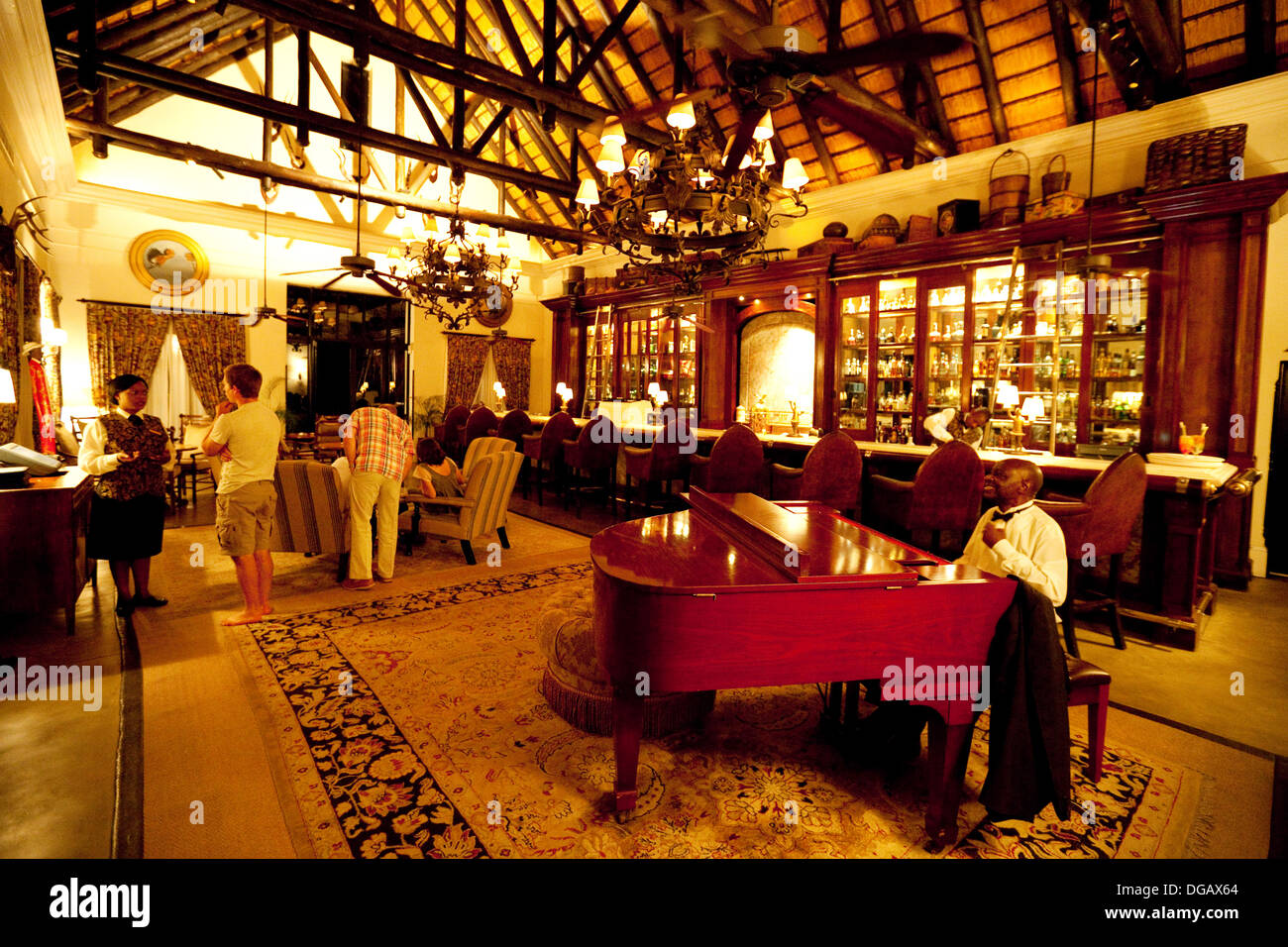 The piano bar in the evening, the Royal Livingstone Hotel, Victoria Falls, Zambia Africa Stock Photo