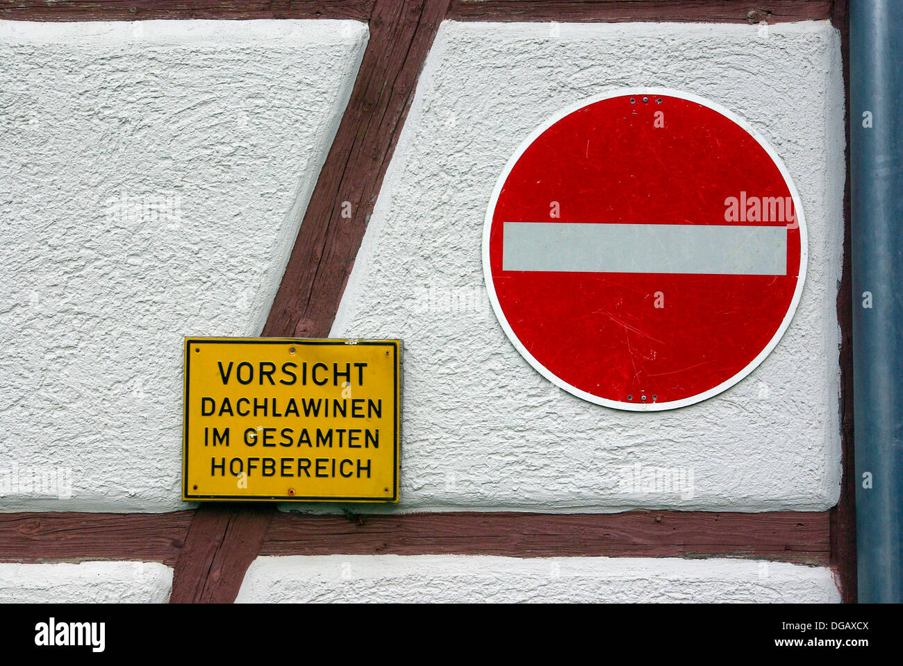 German Warning Sign Attention Roof Avalanche And Drive Through Prohibited Stock Photo