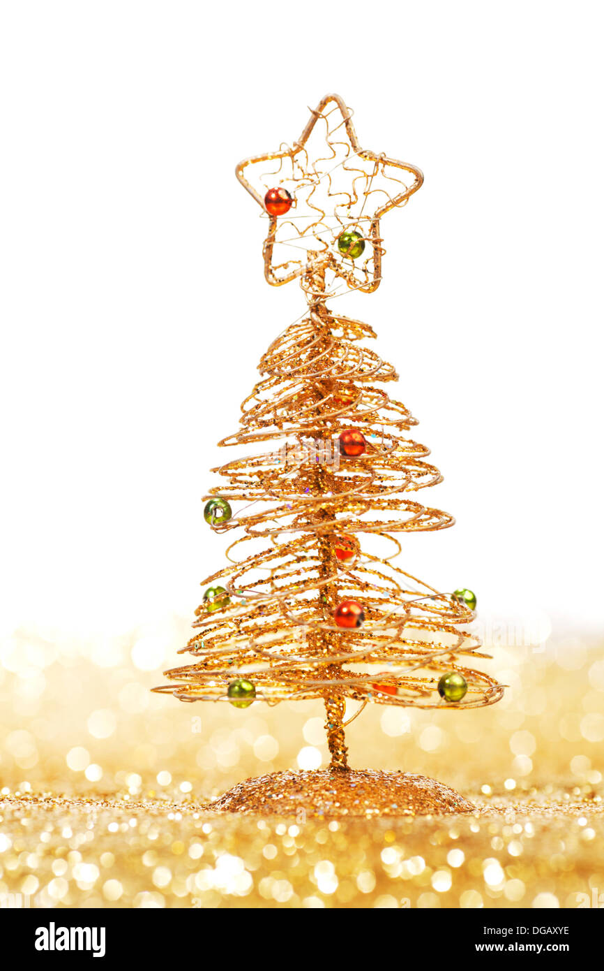 Golden christmas fir tree decoration on glitter background with white ...