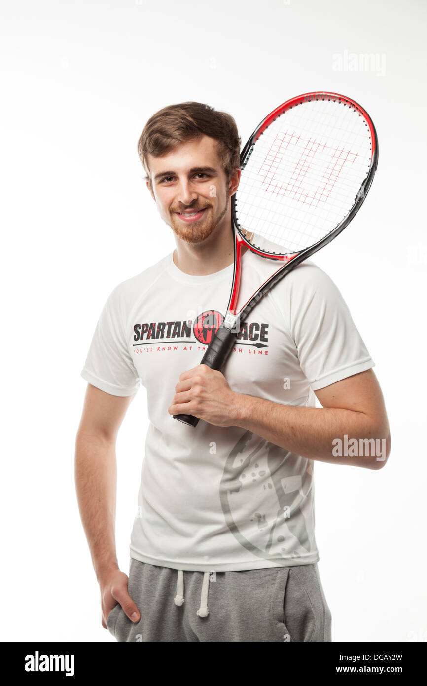 Fit male tennis player model Stock Photo - Alamy