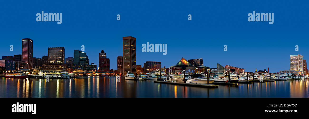 Panoramic view of the Baltimore Inner Harbor Skyline during the blue hour at twilight. Stock Photo