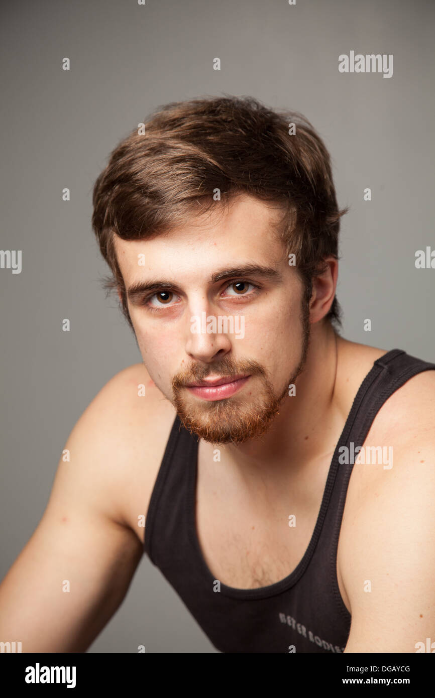 Athletic young male model in T-shirt. Stock Photo