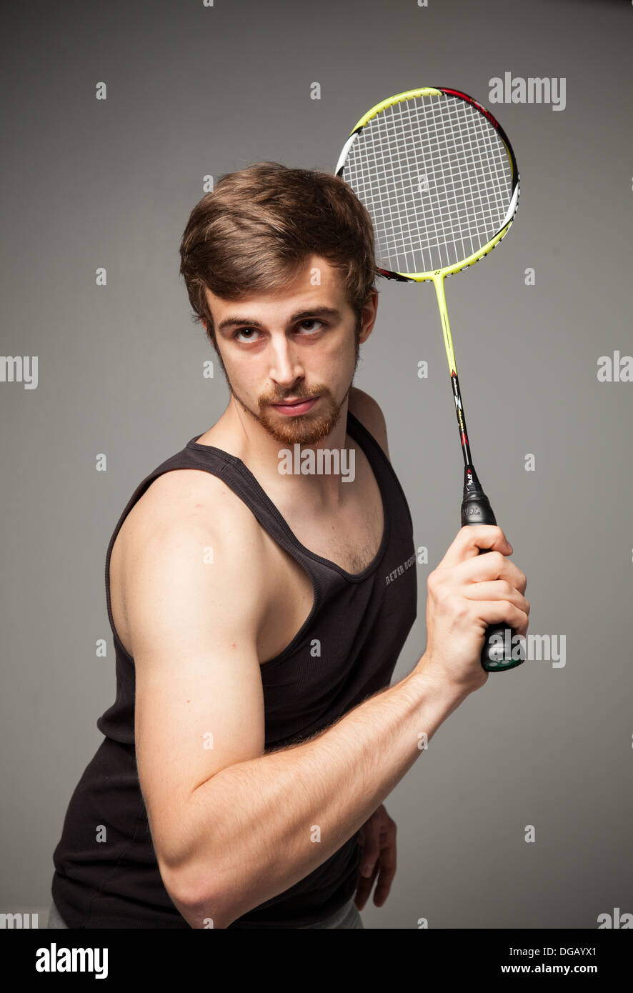 Fit male badminton player model Stock Photo - Alamy