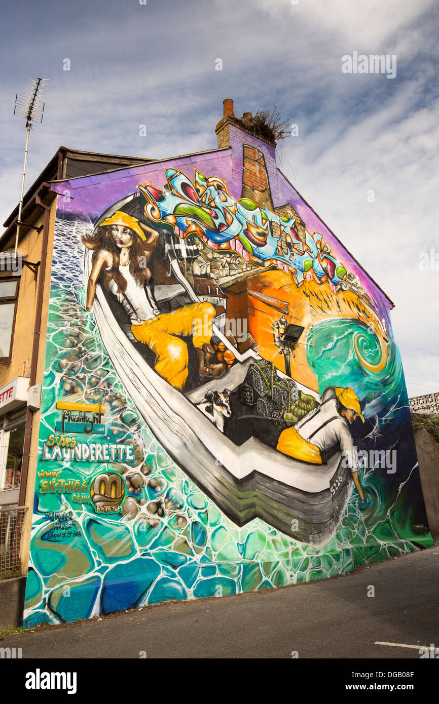 A mural on a launderette wall in St Ives, Cornwall, UK. Stock Photo