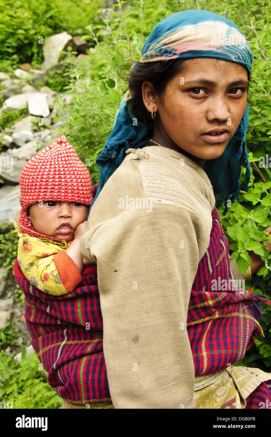 Indian woman carrying baby back hi-res stock photography and images - Alamy