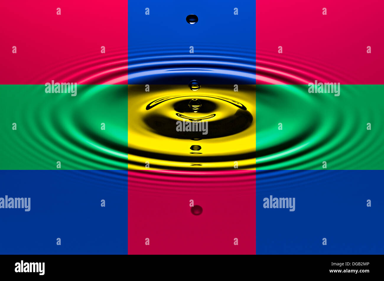 Colorful frames with water drops dripping into a pool of water creating ripples in the surface. Stock Photo