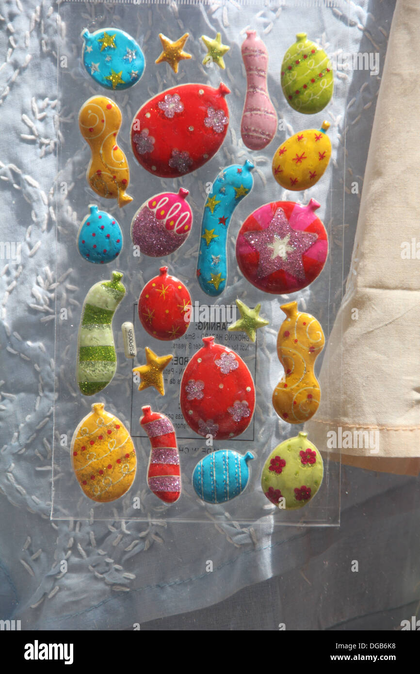 packet of child adhesive decoration stickers in shop window Stock Photo