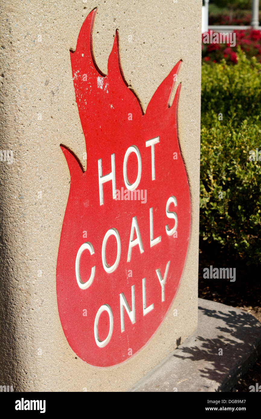 A hot coals disposal bin in a barbecue area of a park in Tustin California as part of the parks