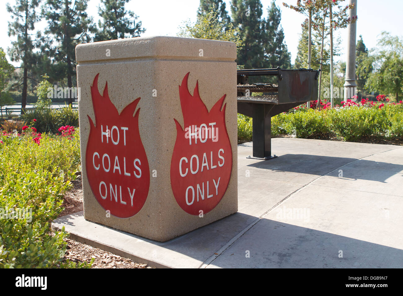 A hot coals disposal bin in a barbecue area of a park in Tustin California as part of the parks